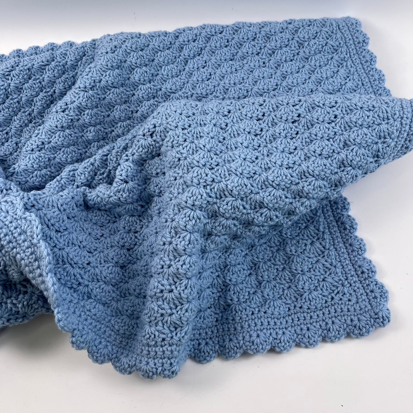 Blanket blue scalloped edge