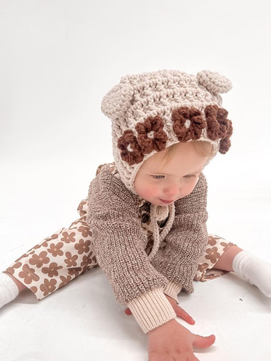 Add flowers to bonnet