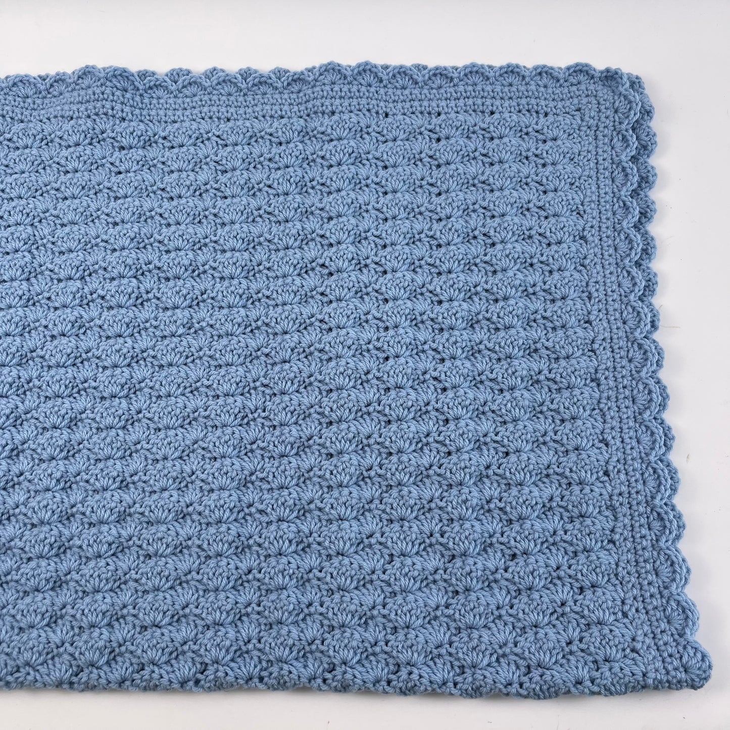 Blanket blue scalloped edge