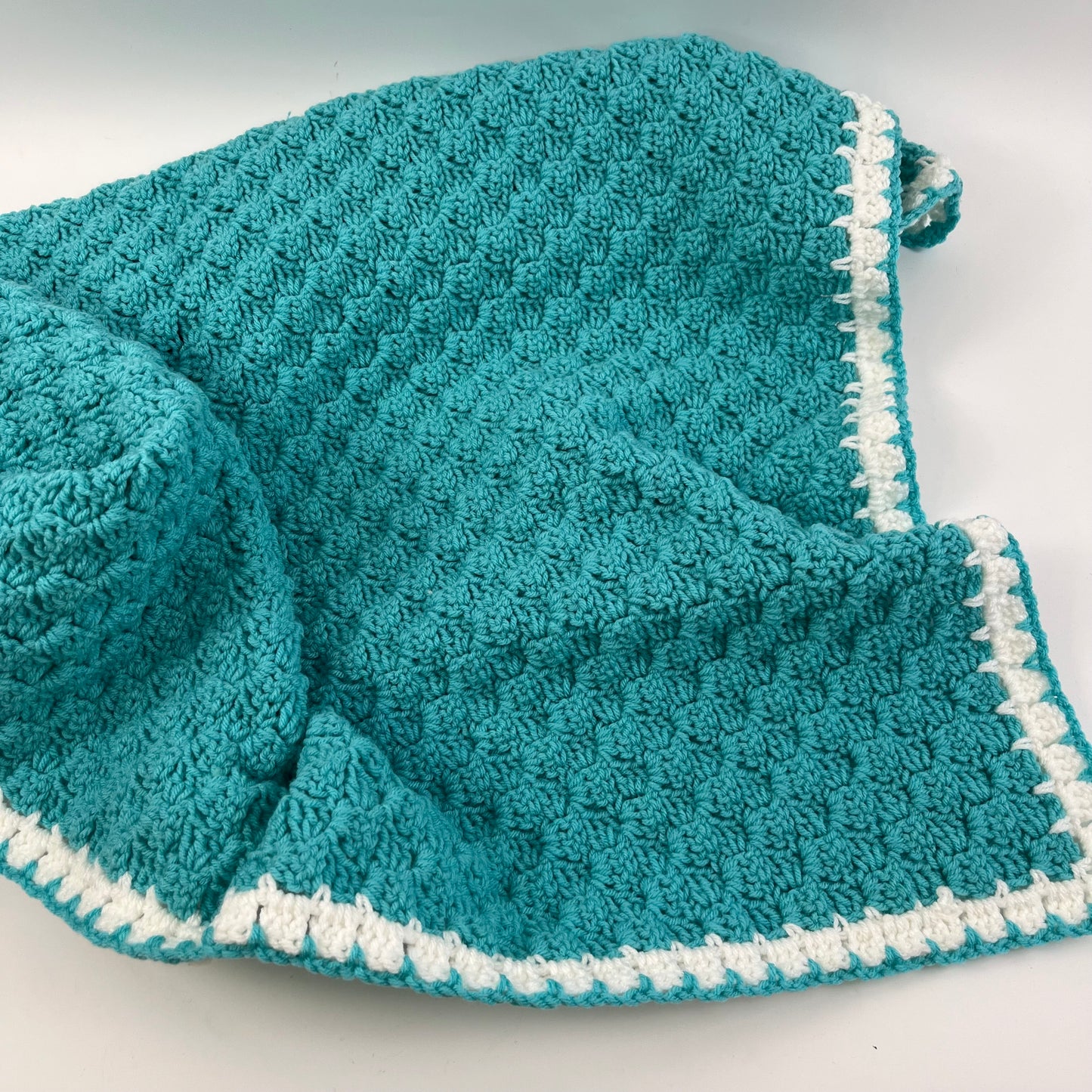 Blanket aqua and white