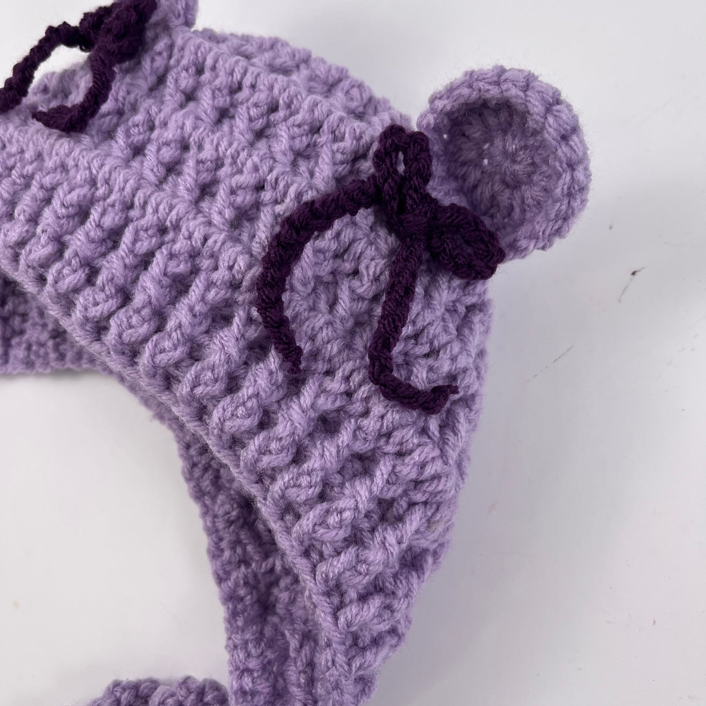 Add bows to bonnet