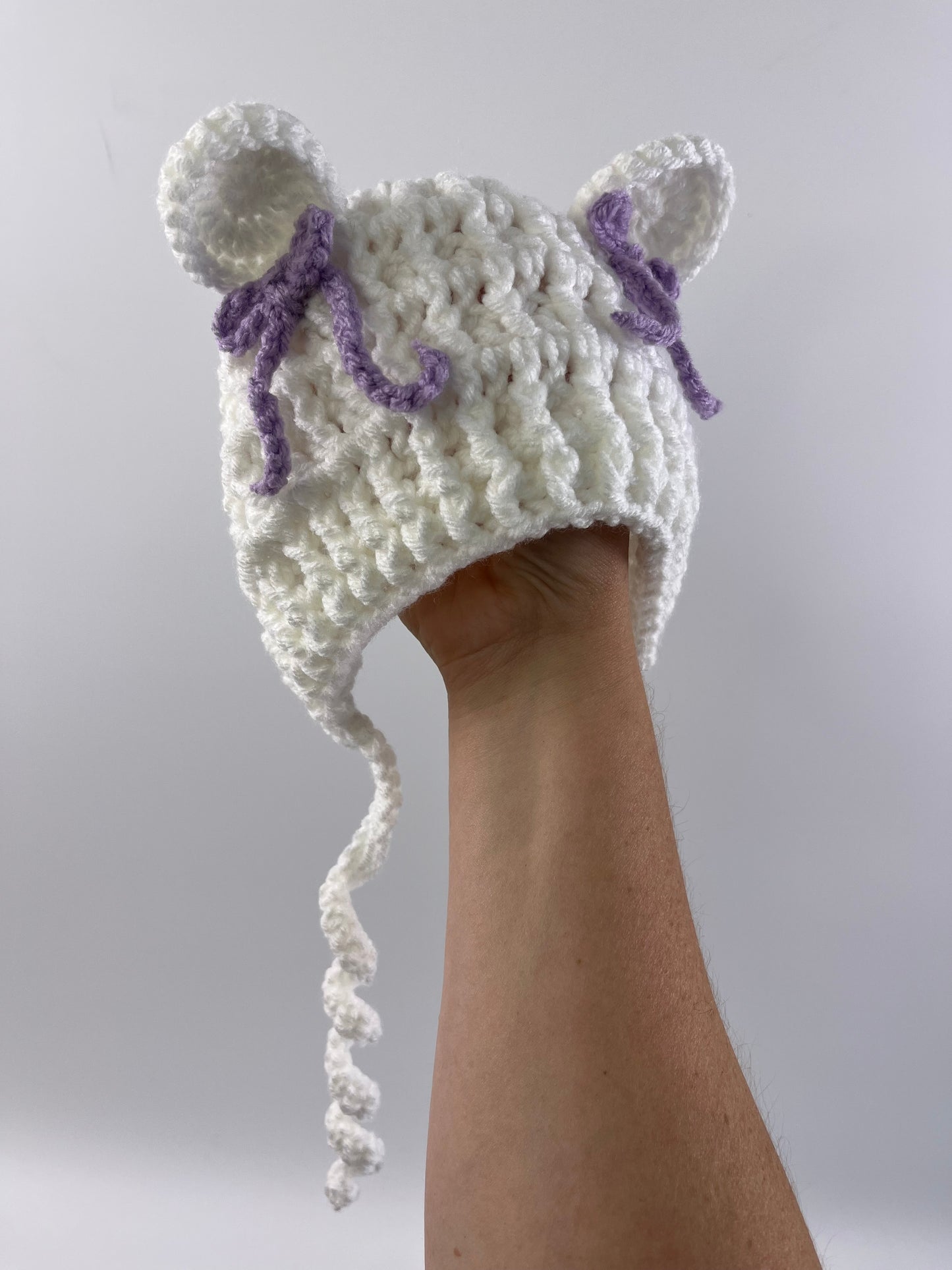 Add bows to bonnet